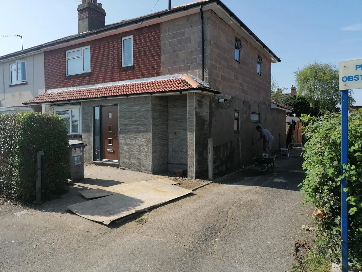 Two-storey side extension built in blockwork